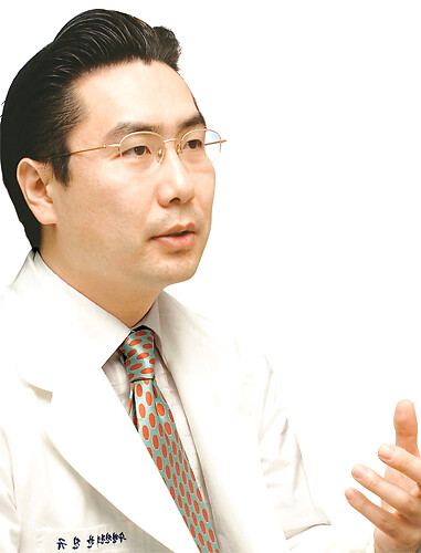 Dr. Han Jin-Kyu, Founder and Director of Seoul Sleep Center, in a clinical coat